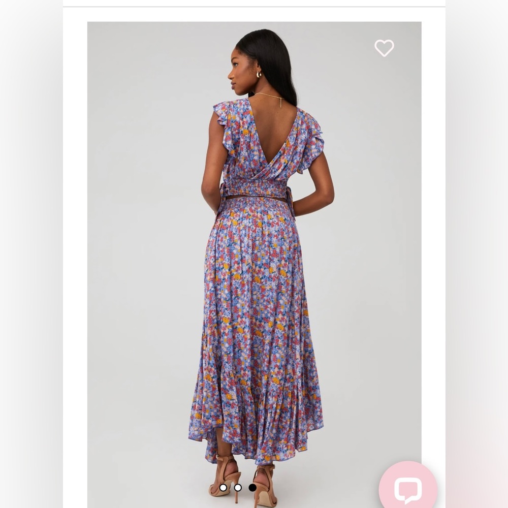 Free people floral 2 piece set size M, skirt can fit up to a L or XL bc stretch